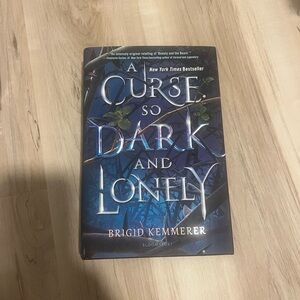 A Curse So Dark and Lonely Book